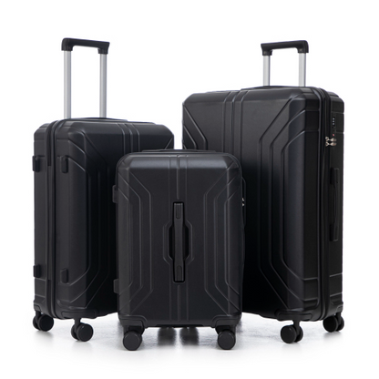 Three black suitcases of different sizes on a white background