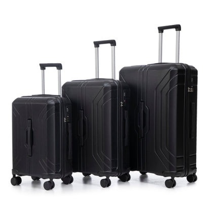 Set of three black suitcases of different sizes on a white background